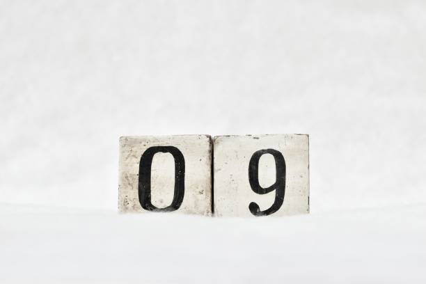 istock 09 calendar date number, white winter background copy space 1446163561