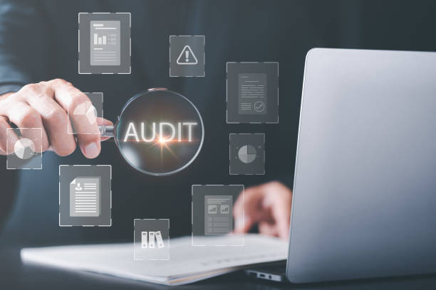 Businessman Audit documents, quality assessment management With a checklist, business document evaluation process, market data report analysis and consulting, plan review process.