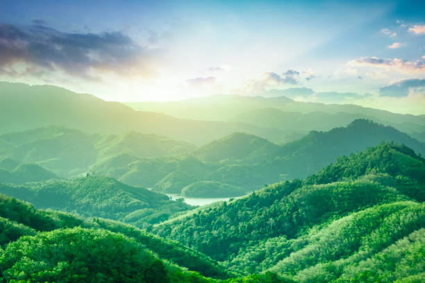 istock Sun shining cloudy sky is on the mountains 1446170240