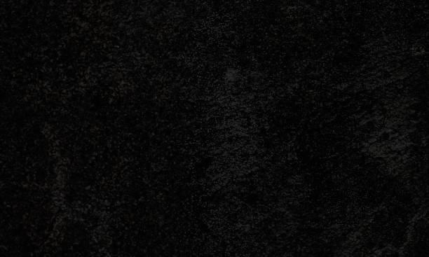 istock Closeup of a textured black background 1446171191