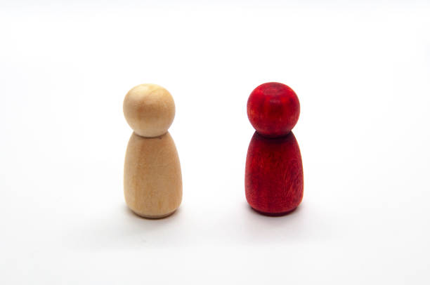 istock Two wooden figure representing diversity 1446173240
