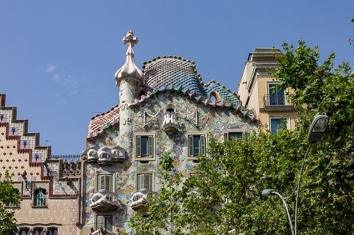 Barcelona, Spain – June 29, 2012: Casa Batllo and Casa Ametller facades ,at famous Passeig de Gracia avenue.They are famous touristic attractions in Barcelona. Spain.