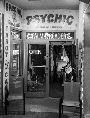 Atlantic Ci, United States – July 31, 2022: A vertical grayscale of a tarot cards reading place in Atlantic city, New Jersey in USA