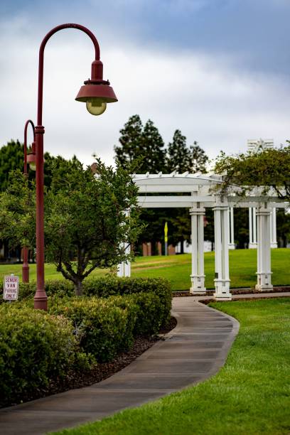istock Trail in a garden with a lamp post and antique columns 1446178333