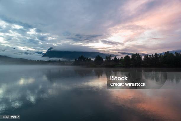 Aerial View Of Lake Surrounded By Trees During Sunset Stock Photo - Download Image Now