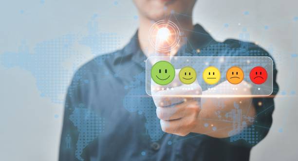 istock Businessman pressing smiley face on virtual screen - customer service experience evaluation concept. 1446181931