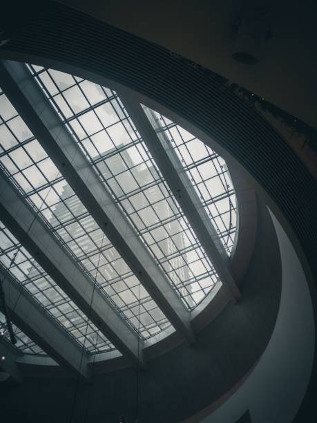 istock Vertical low angle shot of a beautiful circle ceiling with a glass design 1446182564