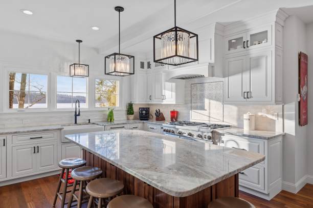 istock White marble table against the white kitchen with small windows 1446182626