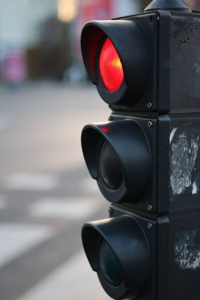 istock Vertical shot of traffic lights with the red light on 1446182726