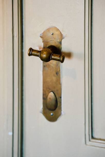 istock Vertical closeup of an old and rustic door knob 1446182807