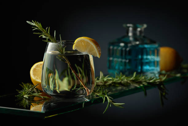 istock Cold refreshing drink with lemon and rosemary. 1446185003