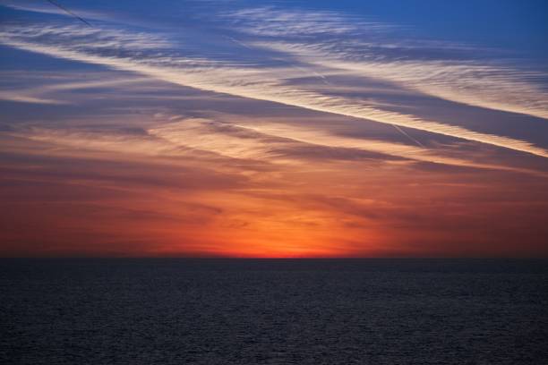 The dramatic blue hour just before the sunrise over the ocean
