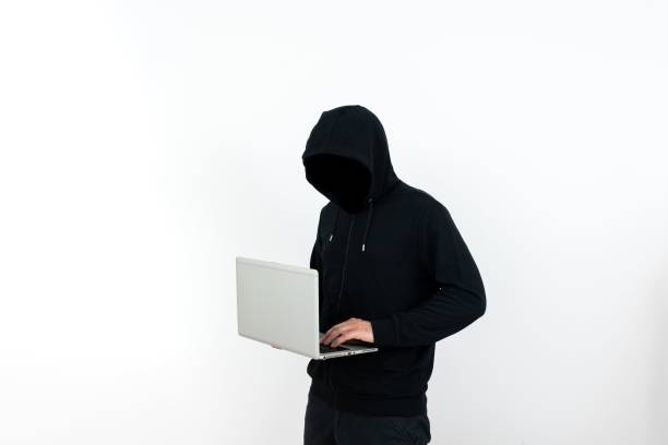 istock Man Standing With Laptop Presenting Cyber Security. Guy Brain Storming Brilliant Strategies. 1446189873