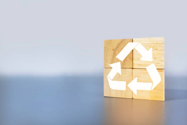 istock recycle icon on wooden box light gray background 1446191100