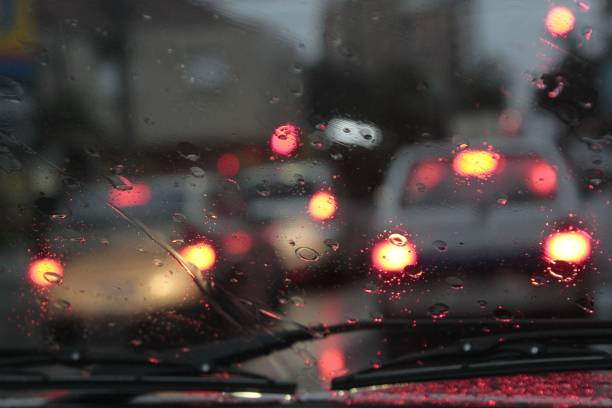 istock View of a traffic jam through the wet window 1446193081