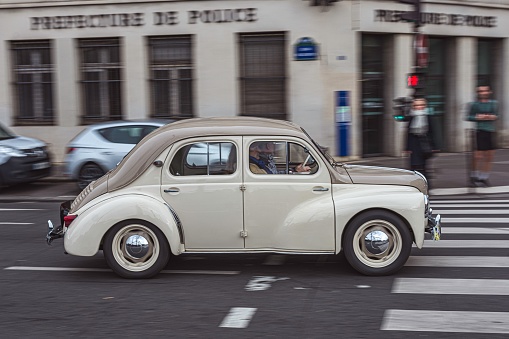 Paris, France – December 25, 2021: Classic town car in the street. Renault 4cv