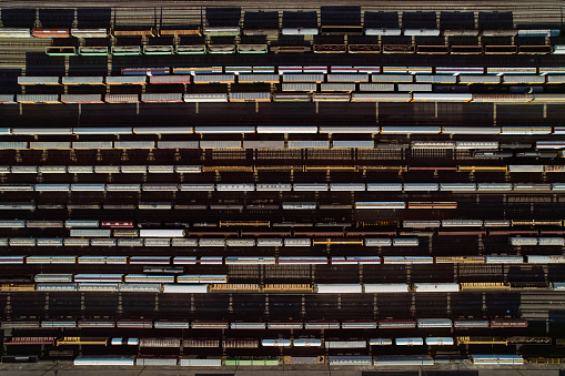 A top down view of railroad cars on a switching yard.