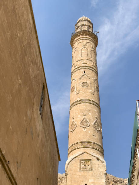 istock Old mosque and minaret workmanship in Mardin city 1446194699
