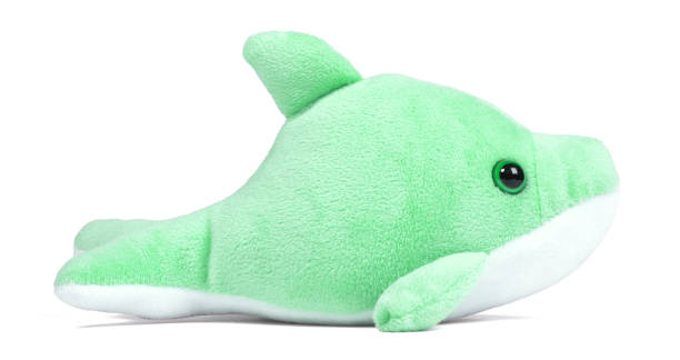 istock Pliuche green toy on white, closeup 1446195052