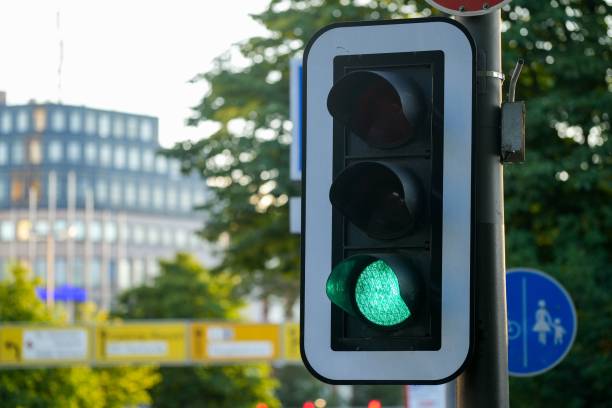 istock Traffic light sign showing green 1446195935