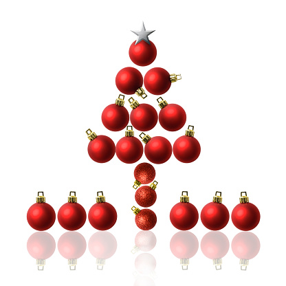 Christmas tree made from red Christmas ornament with silver star on white background.