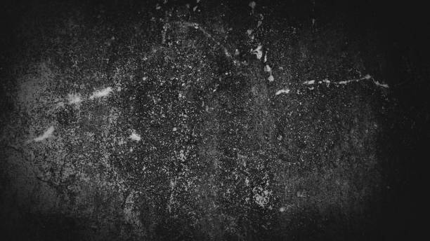 istock Black background of an old wall texture with cracks, marks, and a copy space - great for wallpapers 1446198073