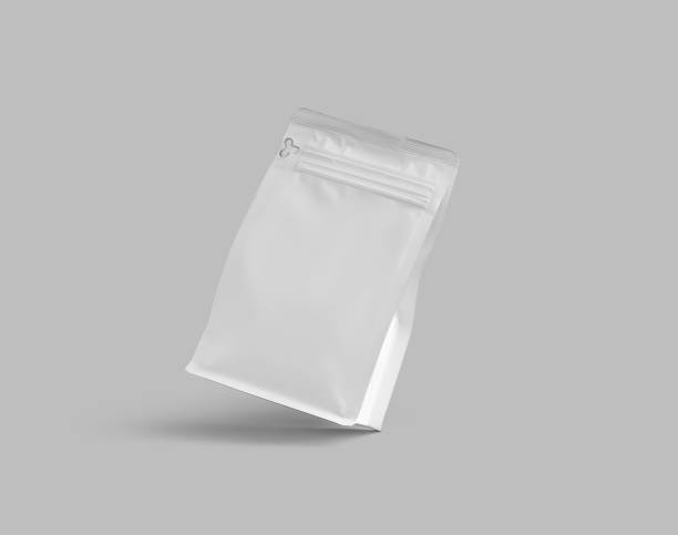 istock Template of a small white doy pack for coffee beans, presentation of zip packaging on the corner, close-up, isolated on background. 1446198321