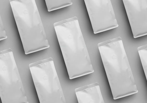istock White coffee pouch mockup, diagonal packaging presentation, top view, isolated on background. Set bag. 1446198451