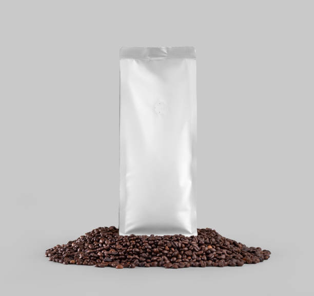 istock White coffee pouch mockup, packaging presentation on coffee beans, front view, isolated on background. 1446198463