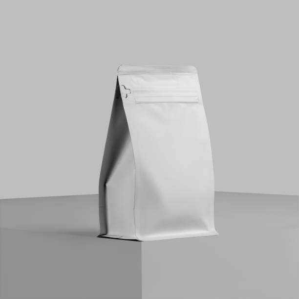 istock Mockup of a white doy pack for coffee beans, a presentation of zip packaging on a cube, close-up, isolated on a background. 1446198647