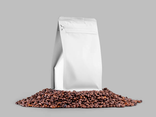 istock Mockup of white doy pack, zip gusset packaging on coffee beans, isolated on the background. 1446198769