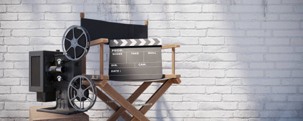 istock Film director's chair and film projector, 3d rendering 1446200637