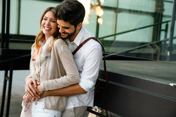 istock Young loving couple hugging and enjoying time together. 1446200893