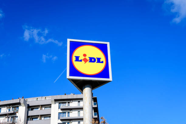 Bucharest, Romania, 14 November 2021: Entry sign with logo for a large Lidl supermarket in a sunny autumn day