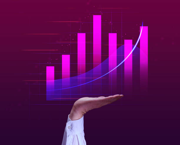 istock A graph with growing indicators and a man's hand on a pink background. Profit growth concept, high profitability 1446207803