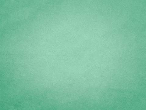Light pastel green mint velvet fabric texture used as background. Empty green fabric background of soft and smooth textile material. There is space for text.