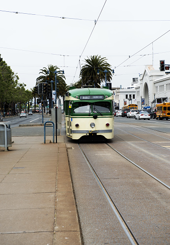 Christchurch, New Zealand - October 10, 2022: Blue tram going through the city.