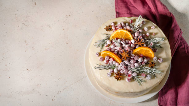 istock Cristmas cake decorated rosemary cranberries 1446223771