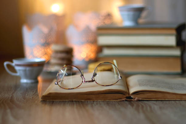 istock Cookies, Tea, Books and Candles 1446234415