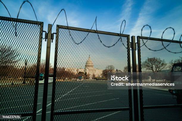 Us Capitol Building Behind Metal Fence With Razor Wire After January 6th Riot Washington Dc Stock Photo - Download Image Now