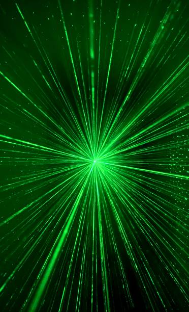 istock Green Laser Beam in dark black room 1446240669