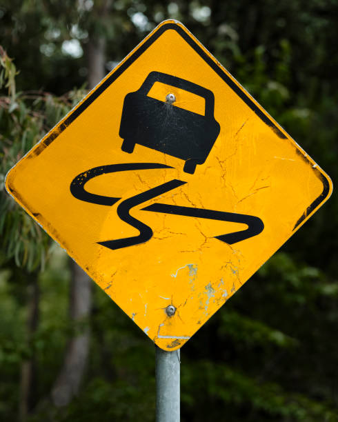 istock Yellow slippery when wet Australian road sign 1446244604