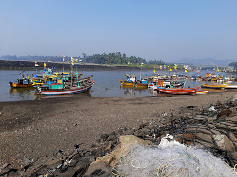 Traditional fishing boats parked near Arabian Sea at Kashid Beach Alibag state Maharashtra