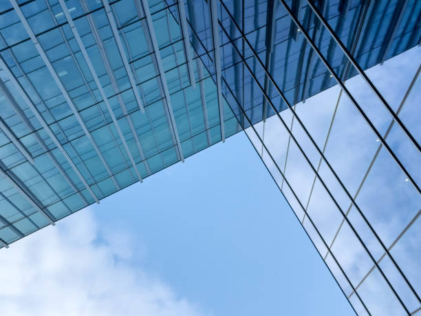istock Low angle view of glass exterior building 1446252390