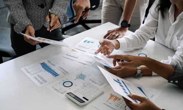 istock Partner meeting business investor working start up project for both company with document data graph, Professional Business teamwork conference project success financial statistics growth profit. 1446253463