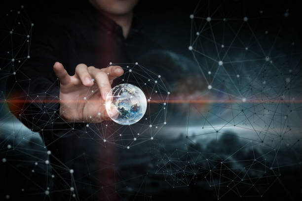 istock The hand clicks on the Globe in the outer space . 1446257985