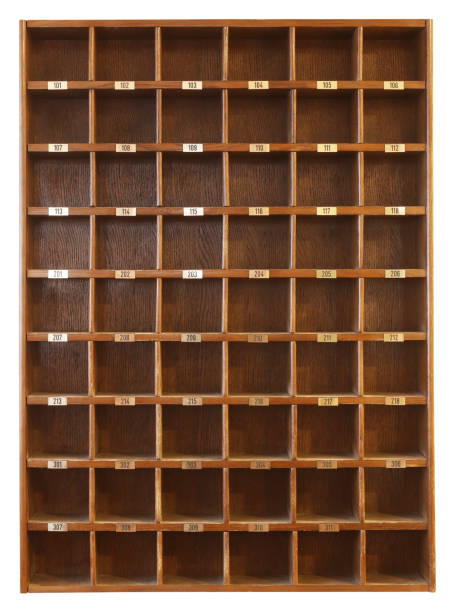 istock Empty reception room keys shelves rack with numbers in hotel or motel isolated on white background. Accommodation concept 1446262997