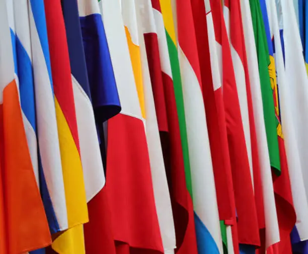 group of many european flags during the international meeting between many nations