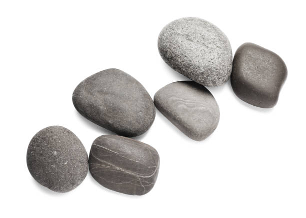 istock Group of different stones on white background, top view 1446265271