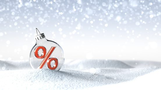 A percent in the Christmas tree globe in the snow.  3d illustration.